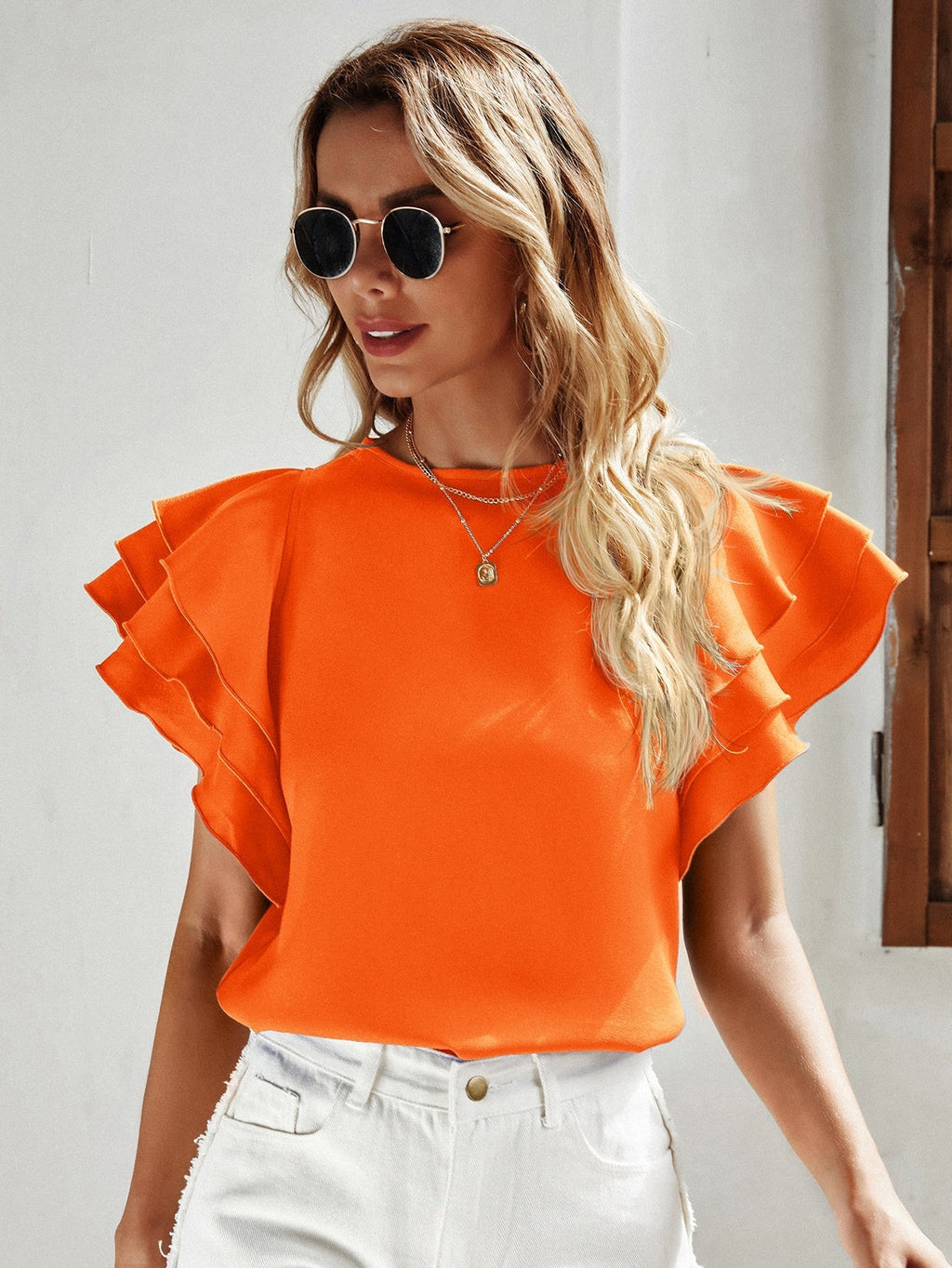 Blusa manga em camadas