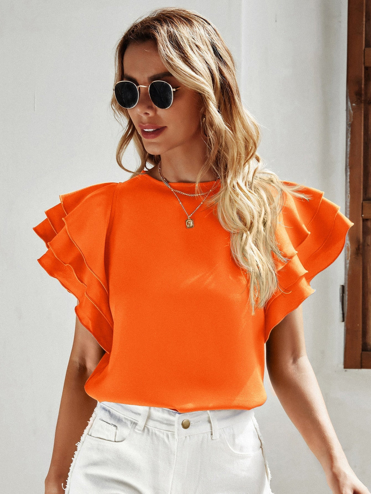 Blusa manga em camadas