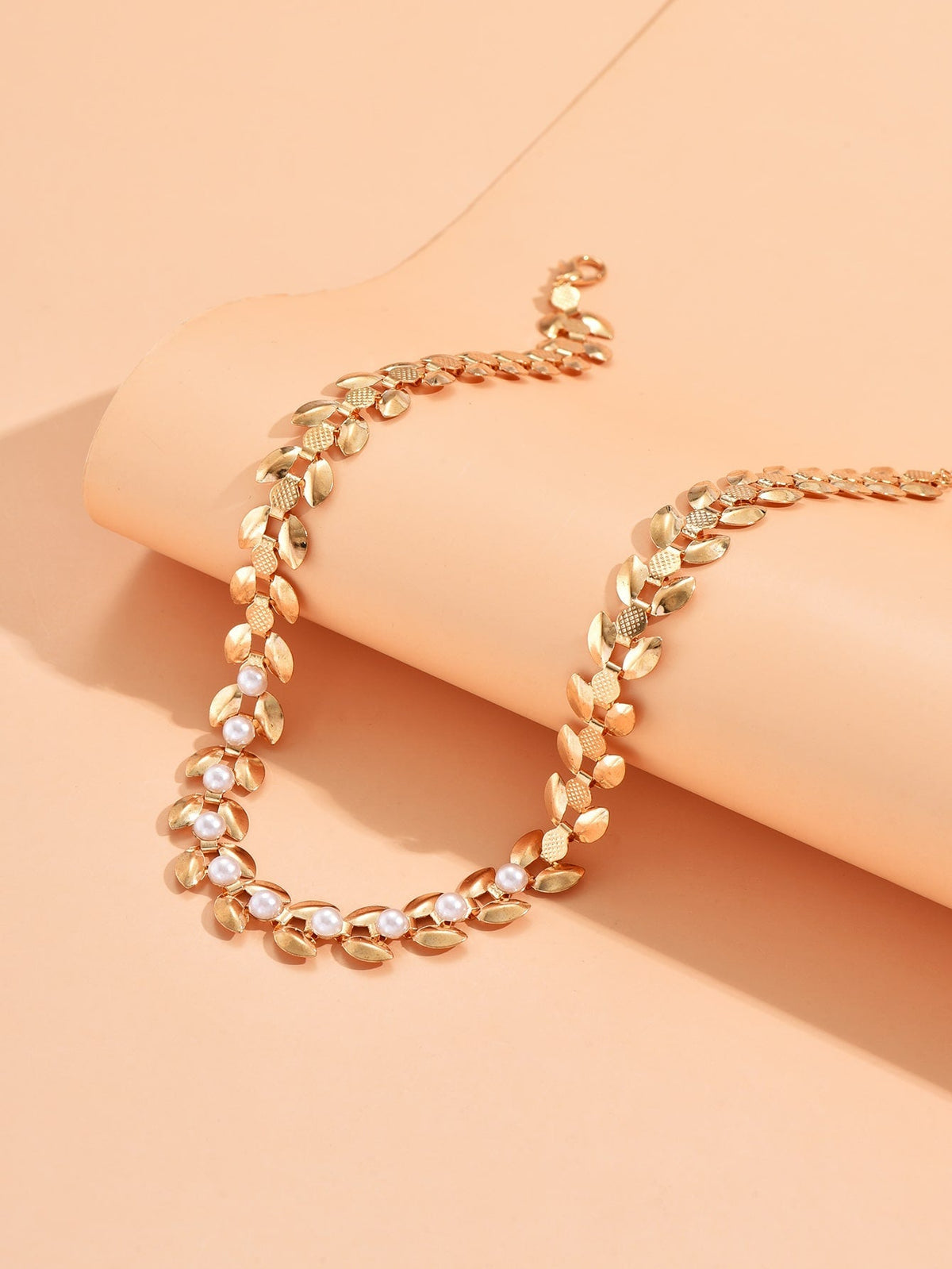Colar com pérolas
