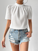 Blusa com gola alta