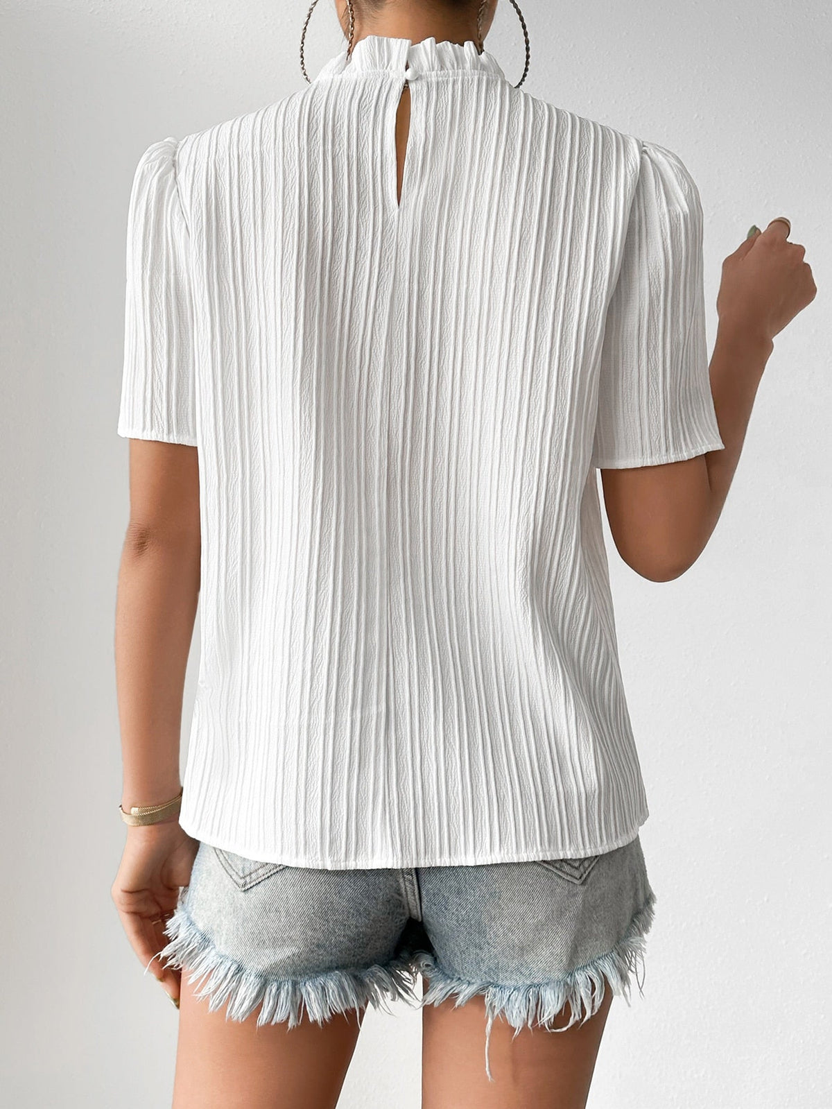 Blusa com gola alta