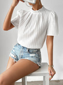 Blusa com gola alta