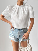 Blusa com gola alta