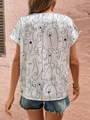 Blusa figura abstrata