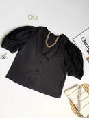 Blusa manga bufante