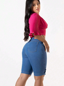 Bermuda jeans detalhe botão lateral